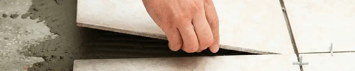 Professional installing ceramic tile floors in Orange, CA