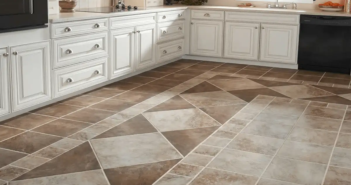 Kitchen with white cabinets and a professionally installed tile floor in Orange, CA