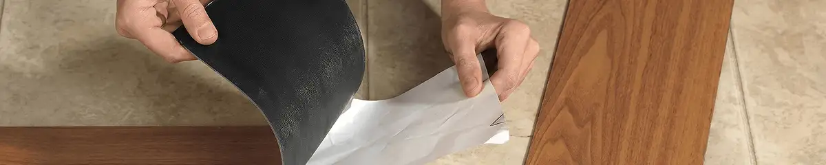 A professional installing vinyl flooring in Orange, CA